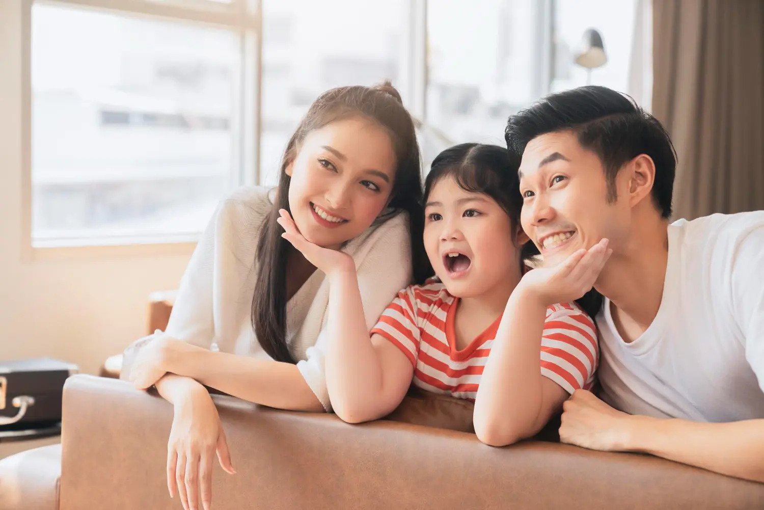 A happy attractive young family healthy harmony in life and beautiful smile cause orthodontic treatment at Star Smiles Orthodontics and Pediatric Dentistry with best orthodontic appliances in Bloomingdale, IL.