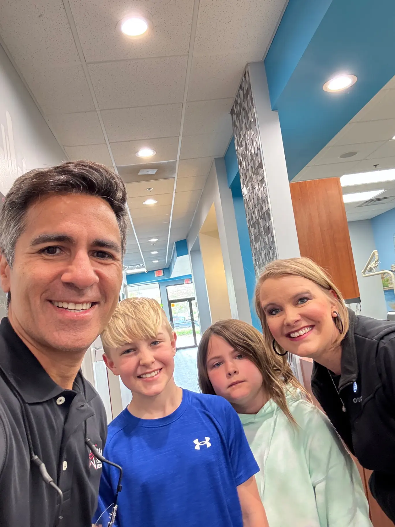 Dr. Andre Jahm, an Orthodontist specialist in Bloomingdale or Naperville with his patients.