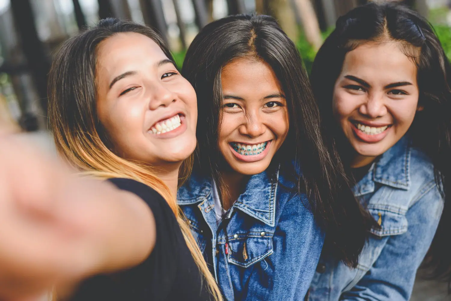 Happy group of young peoplelifestyle of new generation with braces achieving the smile their always dreamed by Star Smiles Orthodontics and Pediatric Dentistry in Bloomingdale and Naperville, IL.