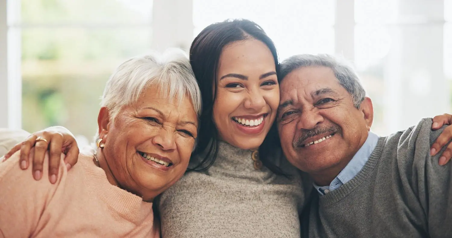 A woman with two adult, smiles during orthodontic journey adult orthodontics treatment at Star Smiles Orthodontics and Pediatric Dentistry in Bloomingdale and Naperville, IL.