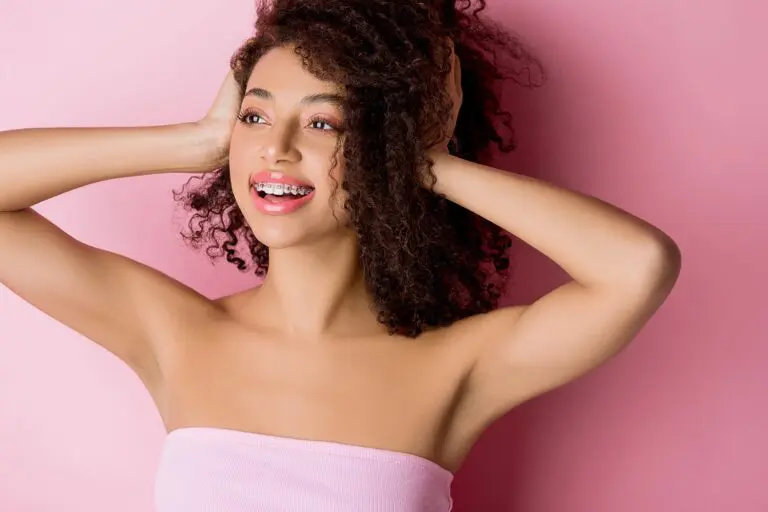 beautiful girl metal braces pink - How to Get Braces Glue Off Teeth in Bloomingdale and Naperville, IL