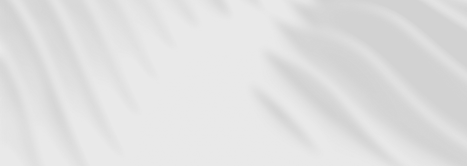 Featuring a soft, wavy pattern of abstract white and gray hues with blurred, diagonal streaks of light and shadow, Star Smile Orthodontics offers this inviting background for their locations in Bloomingdale or Naperville, IL.